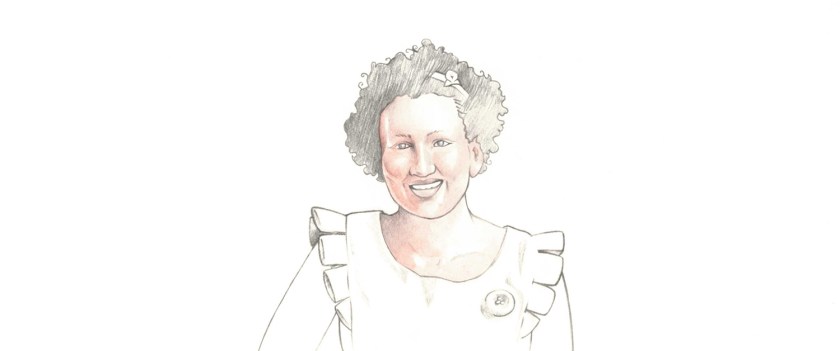 A smiling woman with red skin has a bow in her short curly hair and is wearing a frilly top.